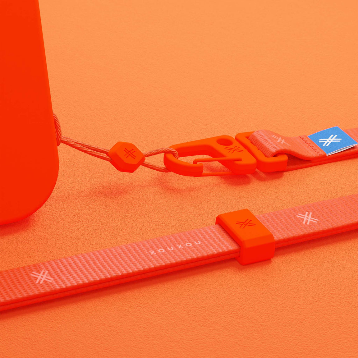 Neon Orange Phone Case with Wrist Strap tone in tone - Detail | XOUXOU